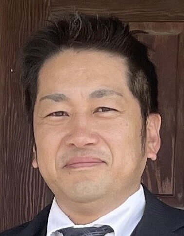 津田　吉典